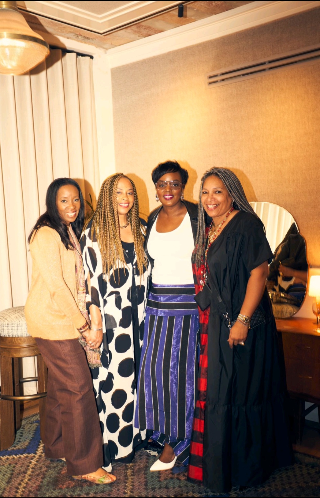 Four women together at an AllBright evening